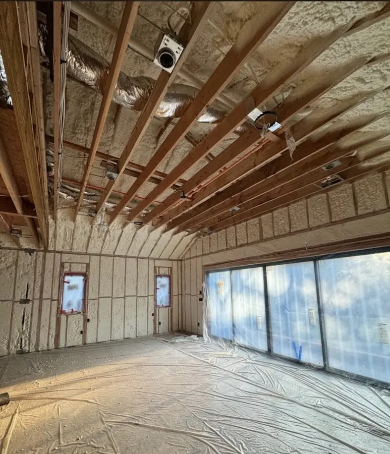 Interior walls and ceiling insulated with spray foam during new construction in Silver Springs Shores